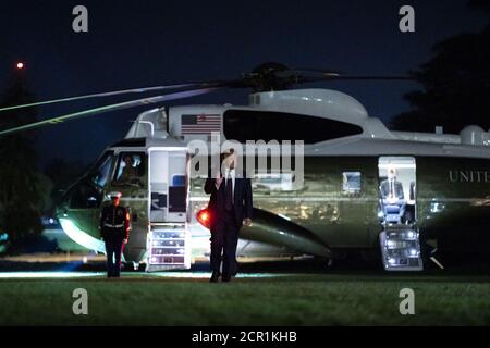 Washington, United States Of America. 15th Sep, 2020. President Donald J. Trump waves as he walks across the South Lawn of the White House Tuesday, Sept. 15, 2020, concluding his trip to Pennsylvania. People: President Donald Trump Credit: Storms Media Group/Alamy Live News