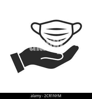 Medical face mask in hand icon. Personal protective equipment, PPE. Vector icon isolated on white background. Stock Vector