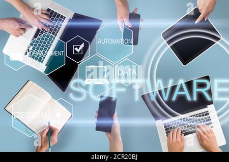 co working team meeting concept,businessman using smartphone and laptop and digital tablet computer in modern office with virtual interface icons Stock Photo