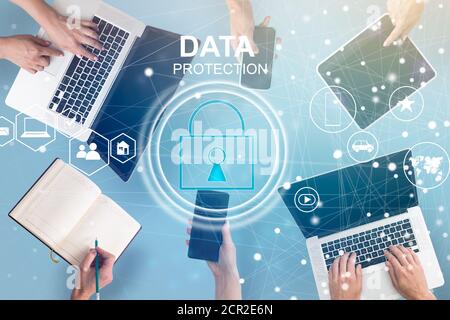 co working team meeting concept,businessman using smartphone and laptop and digital tablet computer in modern office with virtual interface icons Stock Photo