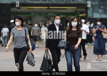 Tokyo, Japan. 17th Sep, 2020. People wearing facemasks are seen walking from Shibuya station.Shibuya Crossing is not as crowded as it used to be before the novel Coronavirus however life goes on at the most famous intersection of Tokyo as wearing facemasks becomes a new normal. Credit: Marina Takimoto/SOPA Images/ZUMA Wire/Alamy Live News Stock Photo