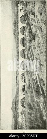 . Concrete bridges and culverts, for both railroads and highways . f f^f !/1 ? ^-^h.^ i I J •&gt; tA/^. a oi ao Q &lt;Z PLAIN CONCRETE ARCH BRIDGES. 93 bridge has a total length of 984 feet, and the deckis 55 feet above the water. It was built during theyears 1902 to 1904 under the direction of HenryHaw good, who was then Chief Engineer for theabove railroad company. It contains eight semi-circular arches of 86 feet clear span, and two endspans of 38 feet. The piers are 14 feet in thickness,making the distance on centers of main piers 100feet. It is made of solid concrete without reinforce-m Stock Photo