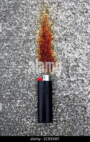 rust stain on cement looks like a flame Stock Photo