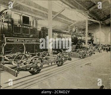 . The street railway review . long east and west, by 500 deepnorth and south, and, with the big boiler room describedin a late issue of the Rhview, cost $1,200,000. The building is spanned by three arched trusses, and the interior reminds the visitor of three immense railroadtrain sheds side by side, surrounded on all sides by 50-foot gallery. These large naves are the avenues of the big electriccranes previously described, and which were the Titanswho helped place the huge masses of machinery inposition. The building is admirably suited to the displays made,and no visitor to the Exposition ca