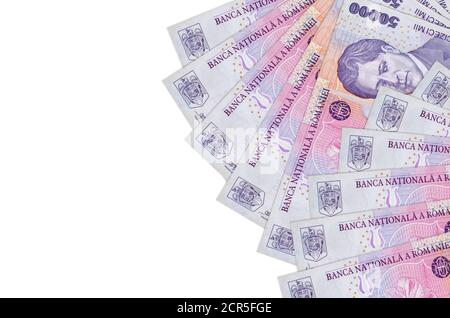 50000 Romanian leu bills lies isolated on white background with copy space. Rich life conceptual background. Big amount of national currency wealth Stock Photo