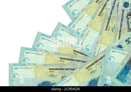 500 Kazakhstani tenge bills lies in different order isolated on white. Local banking or money making concept. Business background banner Stock Photo