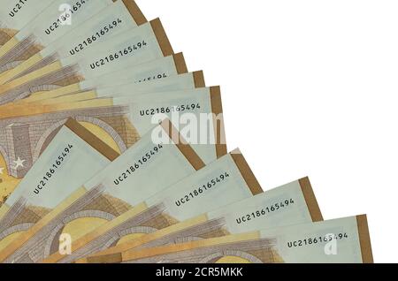 50 euro bills lies isolated on white background with copy space stacked in fan close up. Payday time concept or financial operations Stock Photo