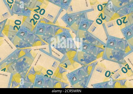 20 euro bills lies in big pile. Rich life conceptual background. Big amount of money Stock Photo