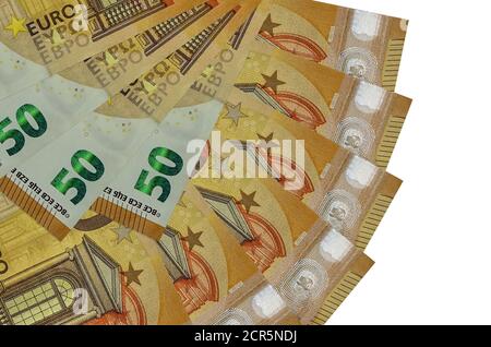 50 euro bills lies isolated on white background with copy space stacked in fan shape close up. Financial transactions concept Stock Photo