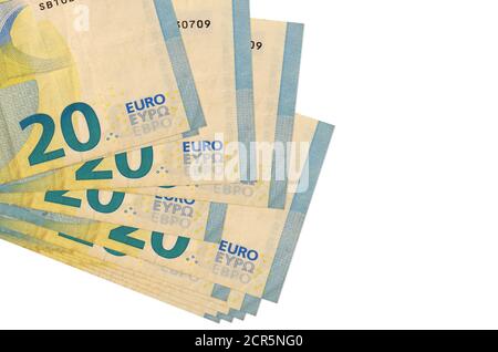 20 euro bills lies in small bunch or pack isolated on white. Mockup with copy space. Business and currency exchange concept Stock Photo