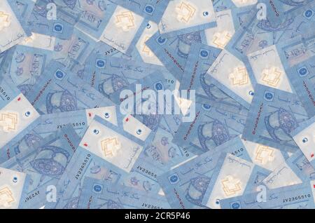 1 Malaysian ringgit bills lies in big pile. Rich life conceptual background. Big amount of money Stock Photo