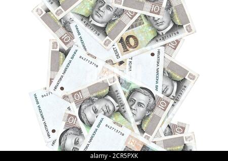 10 Croatian kuna bills flying down isolated on white. Many banknotes falling with white copy space on left and right side Stock Photo