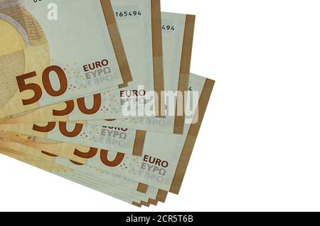 50 euro bills lies in small bunch or pack isolated on white. Mockup with copy space. Business and currency exchange concept Stock Photo