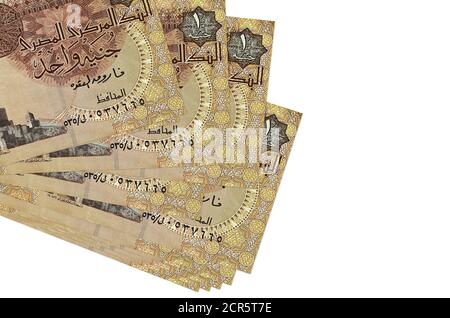 1 Egyptian pound bills lies in small bunch or pack isolated on white. Mockup with copy space. Business and currency exchange concept Stock Photo