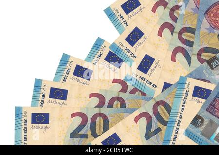 20 euro bills lies in different order isolated on white. Local banking or money making concept. Business background banner Stock Photo