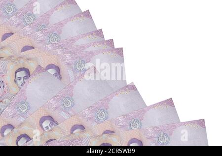 500 Thai baht bills lies isolated on white background with copy space stacked in fan close up. Payday time concept or financial operations Stock Photo