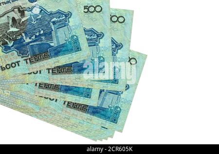500 Kazakhstani tenge bills lies in small bunch or pack isolated on white. Mockup with copy space. Business and currency exchange concept Stock Photo