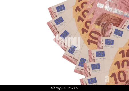10 euro bills lies isolated on white background with copy space. Rich life conceptual background. Big amount of national currency wealth Stock Photo