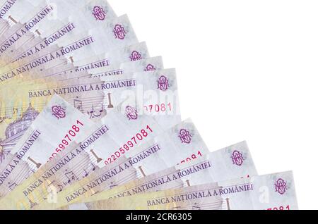 50000 Romanian leu bills lies isolated on white background with copy space stacked in fan close up. Payday time concept or financial operations Stock Photo