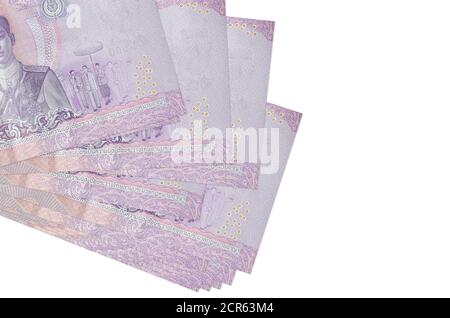 500 Thai baht bills lies in small bunch or pack isolated on white. Mockup with copy space. Business and currency exchange concept Stock Photo