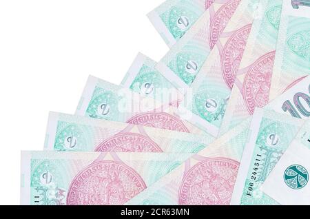 100 Czech korun bills lies in different order isolated on white. Local banking or money making concept. Business background banner Stock Photo