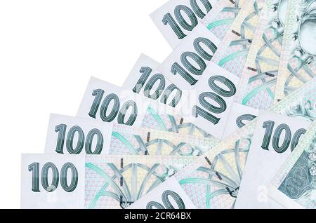 100 Czech korun bills lies in different order isolated on white. Local banking or money making concept. Business background banner Stock Photo