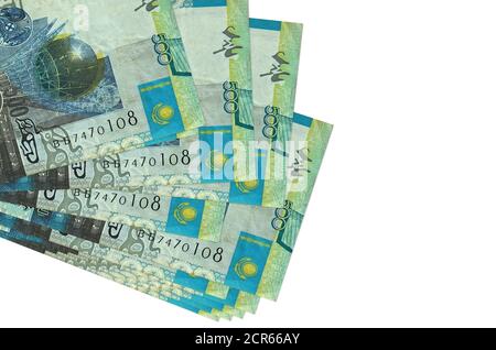 500 Kazakhstani tenge bills lies in small bunch or pack isolated on white. Mockup with copy space. Business and currency exchange concept Stock Photo