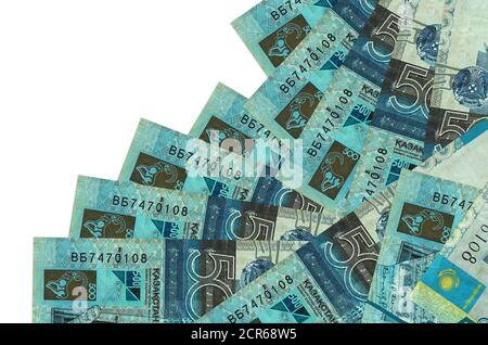 500 Kazakhstani tenge bills lies in different order isolated on white. Local banking or money making concept. Business background banner Stock Photo