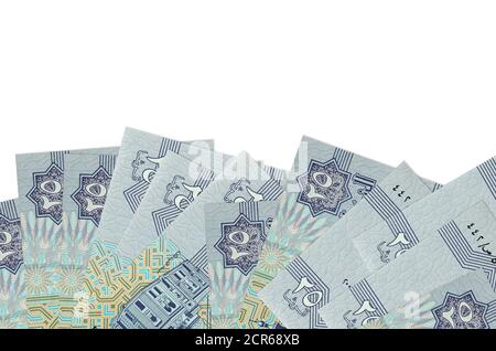 25 Egyptian piastres bills lies on bottom side of screen isolated on white background with copy space. Background banner template for business concept Stock Photo