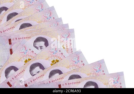 500 Thai baht bills lies isolated on white background with copy space stacked in fan close up. Payday time concept or financial operations Stock Photo