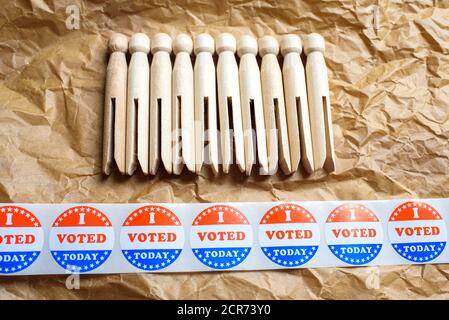 Wooden clothespins on stickers with I voted today during the American elections. Stock Photo