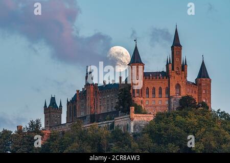 Moon, moonrise, Hohenzollern Castle, Swabian Alb, Baden-Wuerttemberg, Germany, Europe Stock Photo