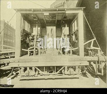 . Electric railway gazette . ld be made of the simpleand effective construction of the brake, whichconsists of a powerful toggle joint and is operatedby a hand lever four feet long, extending throughthe floor of the cab and constructed in such amanner that when the lever is thrown back intoits normal position, the brake is released in apositive manner without the aid of springs. On alternate ends of the plow is a scraper twofeet long, consisting of an oak board two and ahalf inches thick faced with sheet steel of thesame width and one-eighth of an inch thick,curved at the lower edge In such a Stock Photo