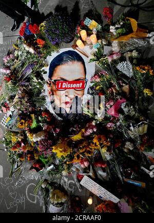 Dc, DC, USA. 19th Sep, 2020. Washington, DC- 09/19/20 Flowers and mementos were placed in front of the US Supreme Court one day after the passing of US Supreme Court Judge Ruth Bader Ginsburg on Sept. 18, 2020, as thousands of people showed up in front to the US Supreme Court to pay their respects and to attend a national vigil for Ginsburg. The vigil was part of a national even scheduled in front of all courthouses in the US. S Credit: Essdras M. Suarez/ZUMA Wire/Alamy Live News Stock Photo