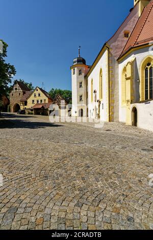 Spitalkirche and Mainbernheimer Tor in Iphofen, Kitzingen district, Lower Franconia, Bavaria, Germany Stock Photo