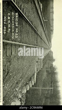 . Annual report of the Railroad and Warehouse Commission of the State of Illinois . located not far from the end of a curve. These sema-phores are usually located from one thousand to fifteen hundred feet from theswitch it governs. Galena Die, Aurora Branch.—This line extends northward from Geneva ashort distance to St. Charles and southward to Aurora. It is a single trackline laid with 60-lb. steel, with even points on cedar and oak ties, and fastenedwith angle bars of suitable weight. Split switches with stiff frogs and the oldstyle circular switch stands as well as a few Ramapol stands are Stock Photo