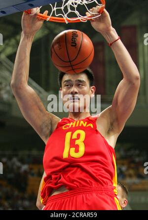 China S Yao Ming Slam Dunks Two Points Against Argentina During Round Two Of The Fiba World Basketball Championship September 2 02 In Indianapolis Indiana Argentina Defeated China 95 71 Ming Plays For The
