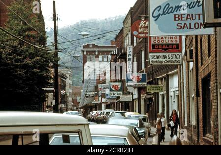 Main Street of Logan, West Virginia, Showing a Narrow Street with Parking on Only One Side Which Is Typical in Many of the Small Towns in Southern West Virginia April 1974 Stock Photo