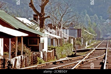 View of Miners' Homes in a Coal Company Town near Logan West Virginia. Next to the Railroad Tracks April 1974 Stock Photo