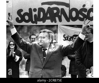 Former Polish President and Solidarity founding leader Lech Walesa shows v-sign in front of Solidarity poster during his presidential campaign in Plock in this May 7, 1989 file photo. Two decades after the birth of Solidarity, the Soviet blocs first free trade union, many young Poles need textbook lesson on communism to learn about tank-controlled streets or empty shelves in grocery stores. Solidarity sweeping victory in the partially free vote in 1989 paved the way to the dismantling of communism in eastern Europe, the fall of the Berlin Wall and the bloody removal of Romanian leader Caucescu