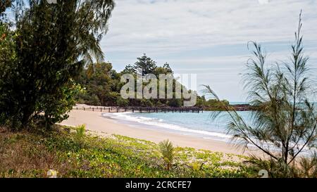 A netted swimming enclosure on a beach to protect swimmers from stingers and sharks Stock Photo