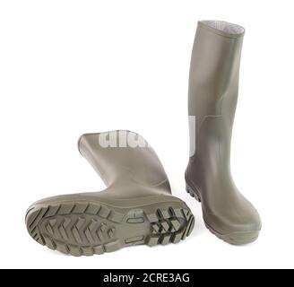 A pair of clean green rubber boots isolated on white background. Front view. Stock Photo