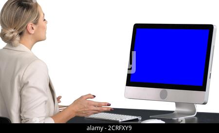 Video chat with someone by young woman, white background. Blue S Stock Photo