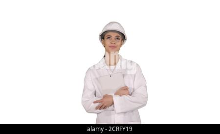 Female doctor engineer walking with digital tablet on white back Stock Photo