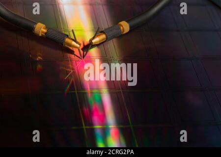 Manual probe system with needles for test of semiconductor on silicon wafer. Selective focus. Stock Photo