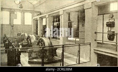 . Electric railway journal . BRITISH FREIGHT ELECTRIFICATION—CROSS-SECTION OF SUBSTATION July 1, 1916] ELECTRIC RAILWAY JOURNAL 9. BRITISH FREIGHT ELECTRIFICATION INTERIOR VIEW OF SU3STATI0N present installing at Erimus another set of 1200-kw.capacity, consisting of two 600-kw. rotary converterscoupled in series to form one unit. The substations in general are arranged in three sec-tions, one for the switch gear, one for the rotaries,which on account of the high tension are surrounded byscreens, and one for the transformers. In connectionwith the latter it may be said that two auxiliary trans- Stock Photo