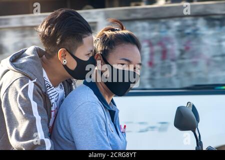 SAMUT PRAKAN, THAILAND, JUN 23 2020, The romantic moment of pair at ride of motorbike. Stock Photo