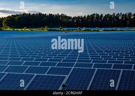 Many Photovoltaik solar panels arranged as part of a big solar powerplant Stock Photo