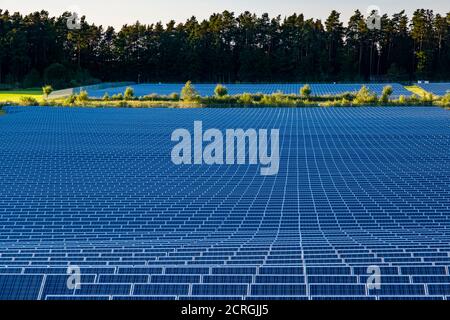 Many Photovoltaik solar panels arranged as part of a big solar powerplant Stock Photo
