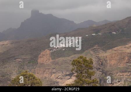 Roque Palmes, village of El Toscon and Roque Bentaiga. The Nublo Rural Park. Tejeda. Gran Canaria. Canary Islands. Spain. Stock Photo